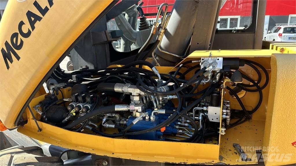 Mecalac 10MSX 4X4 حفارات بعجل