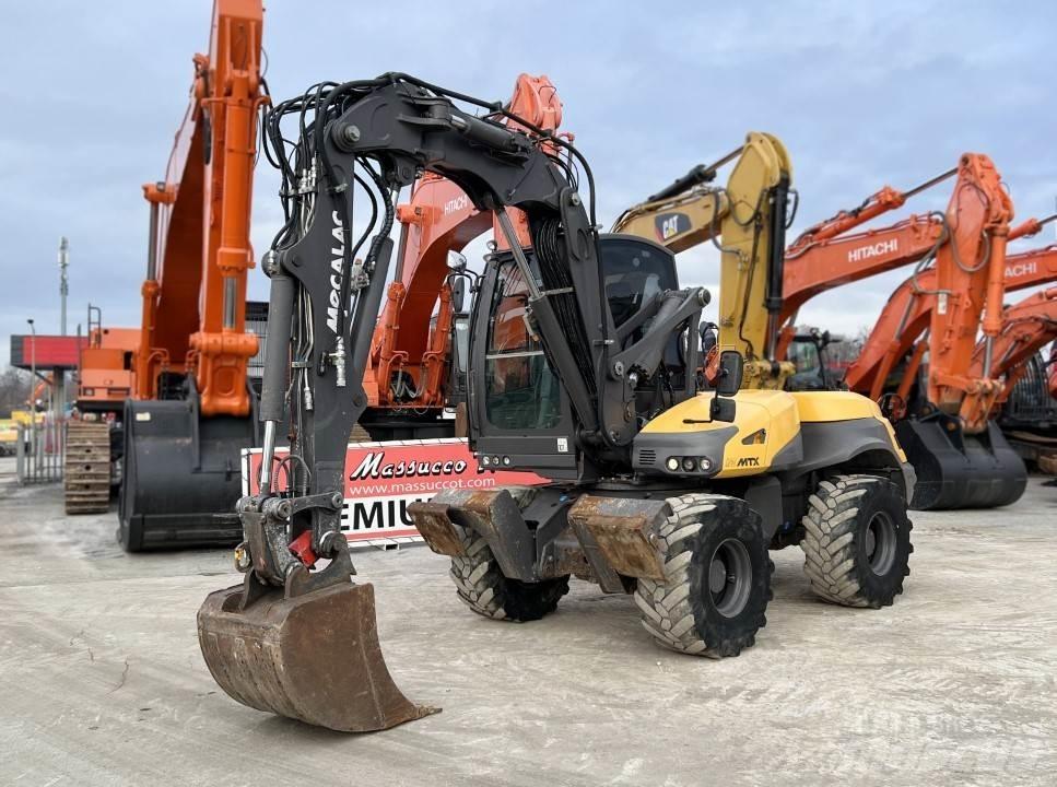 Mecalac 12 MTX حفارات بعجل