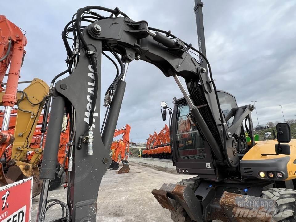 Mecalac 12 MTX حفارات بعجل