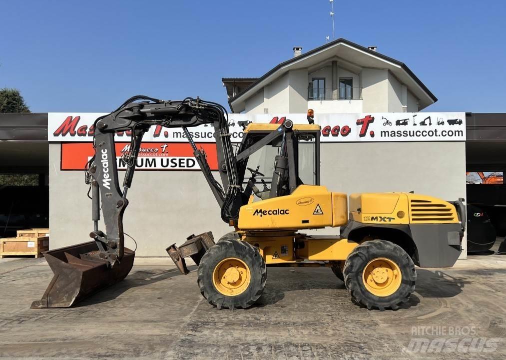 Mecalac 12MXT-E حفارات بعجل