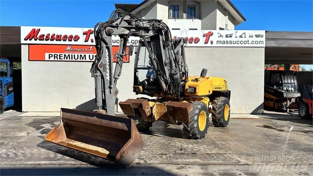 Mecalac 12MXT - E حفارات بعجل