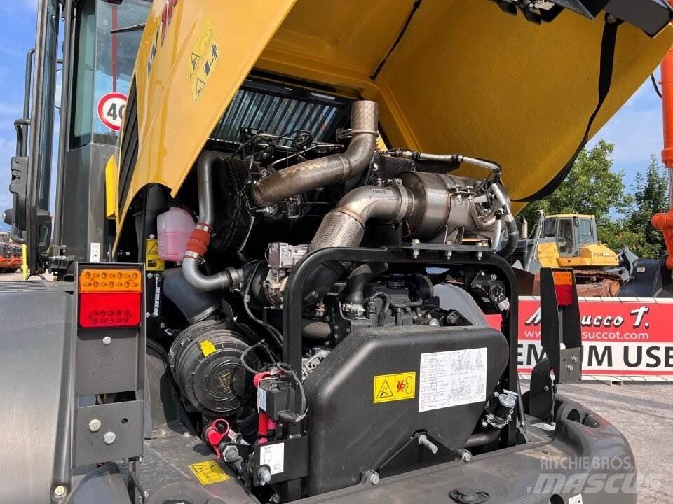 New Holland W110D لوادر بعجل