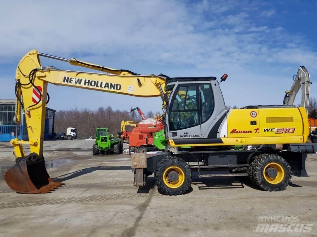 New Holland WE210 حفارات بعجل