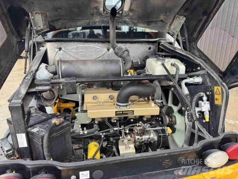 JCB 406 لوادر بعجل