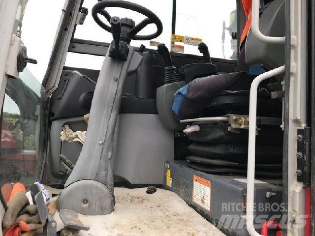 Takeuchi TB295W حفارات بعجل