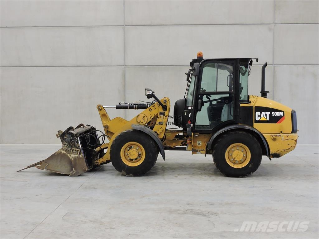 CAT 906 لوادر بعجل
