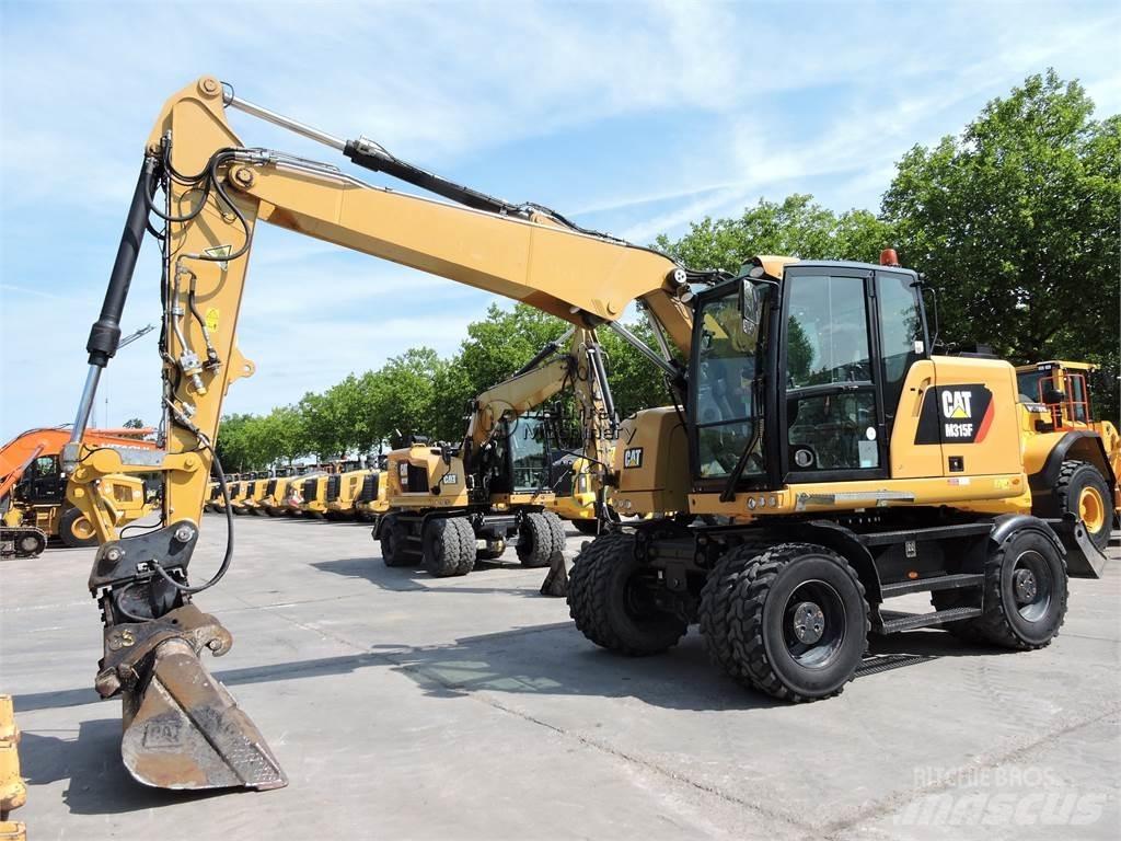 CAT M315 حفارات بعجل