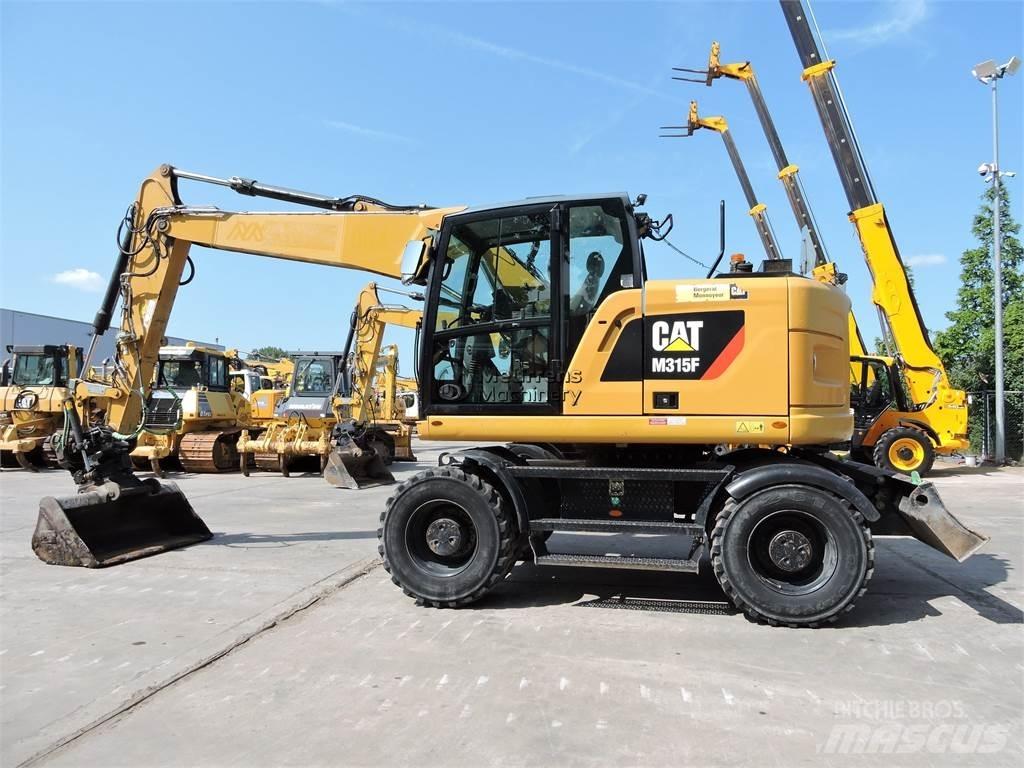 CAT M315 حفارات بعجل