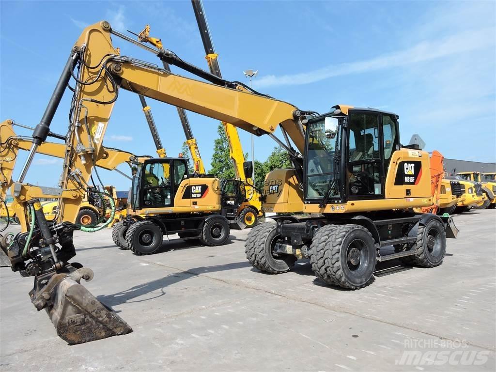 CAT M315 حفارات بعجل