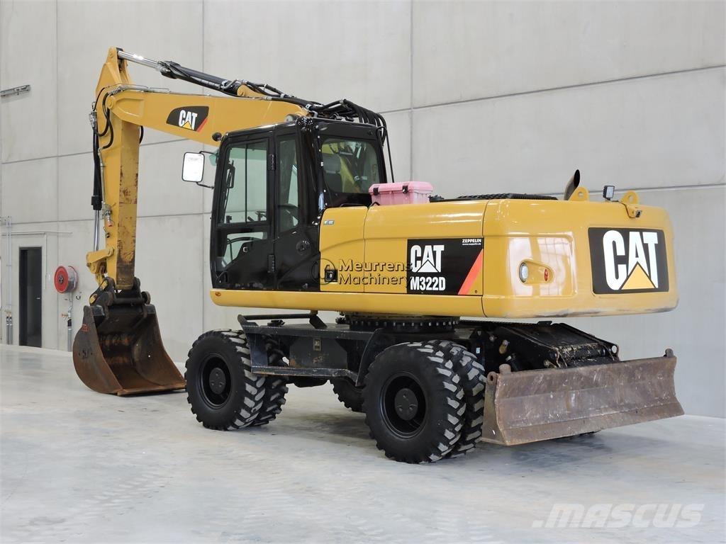 CAT M322D حفارات بعجل