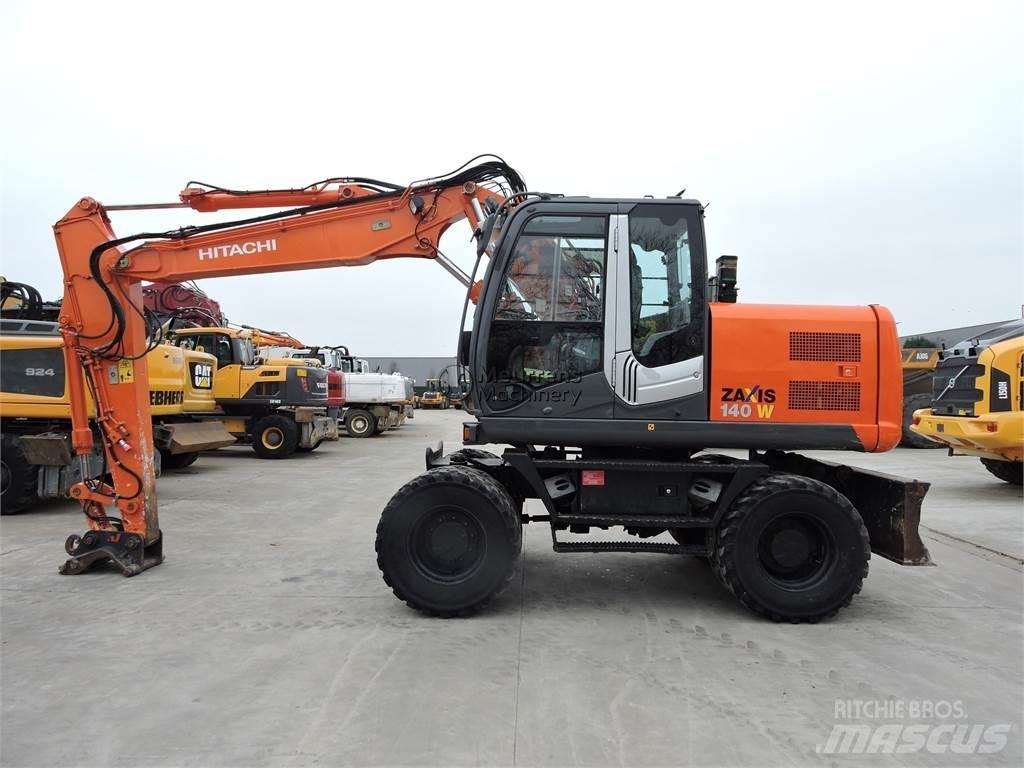 Hitachi ZX140W حفارات بعجل