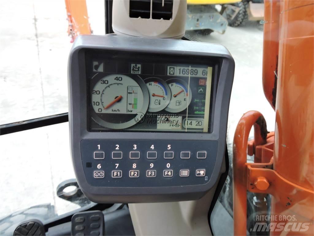 Hitachi ZX140W حفارات بعجل