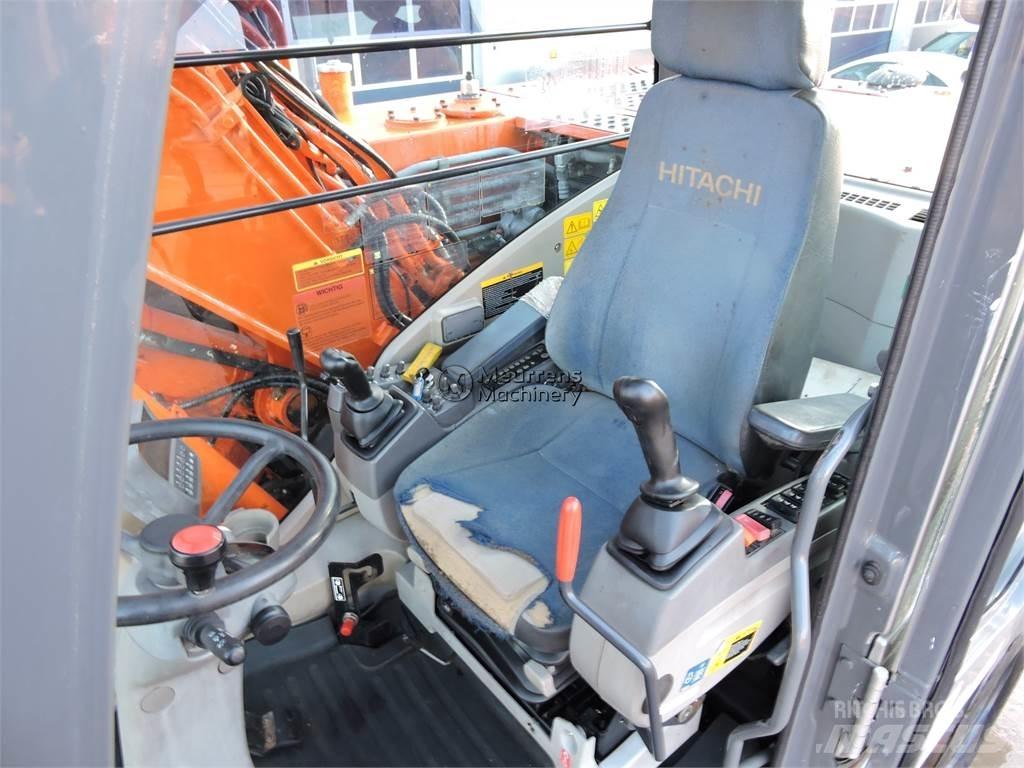 Hitachi ZX140W حفارات بعجل