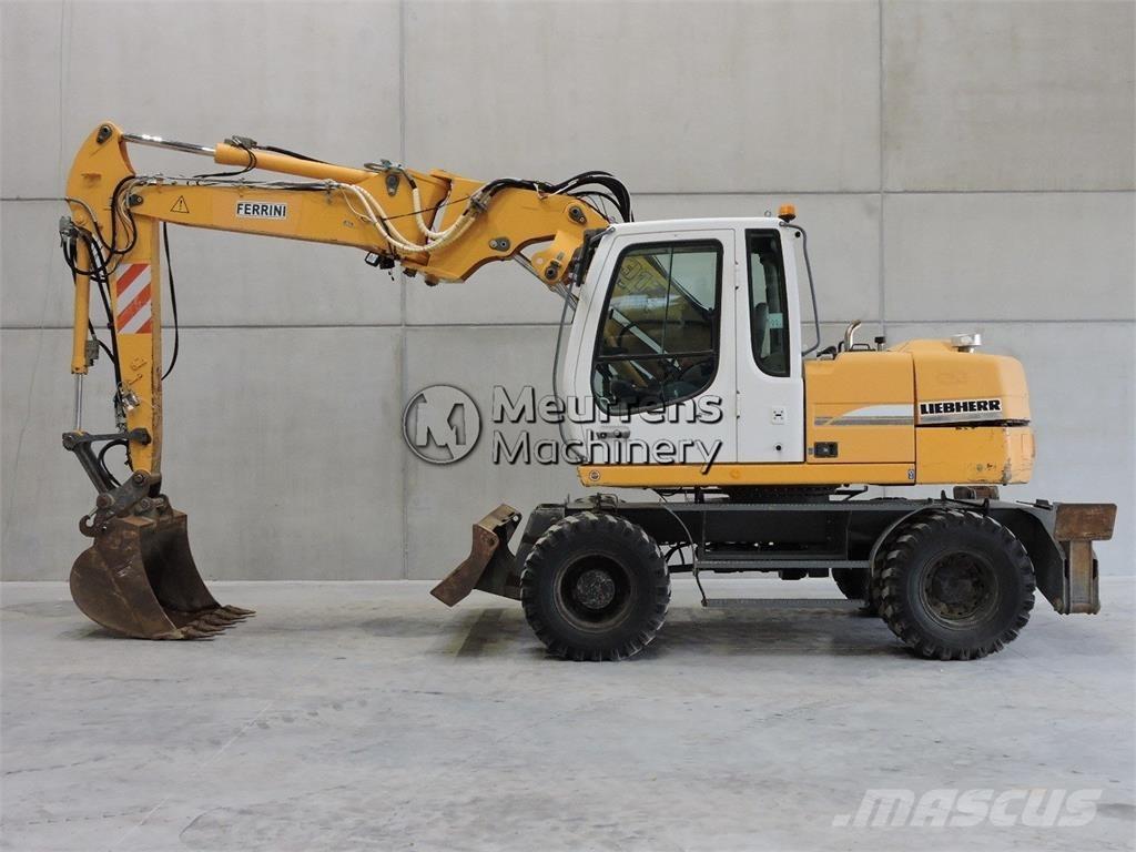 Liebherr A312 حفارات بعجل