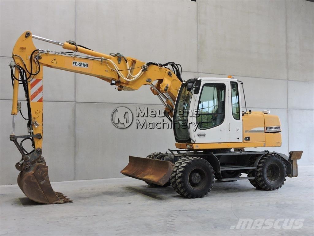 Liebherr A312 حفارات بعجل