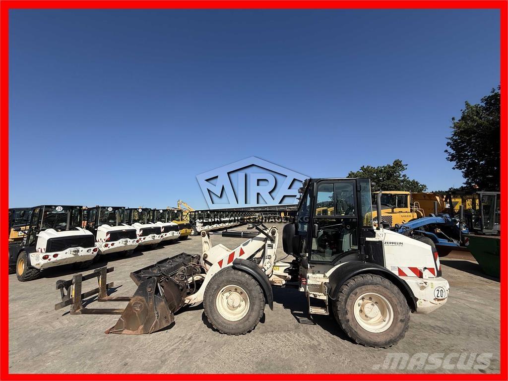 CAT 908 M لوادر بعجل