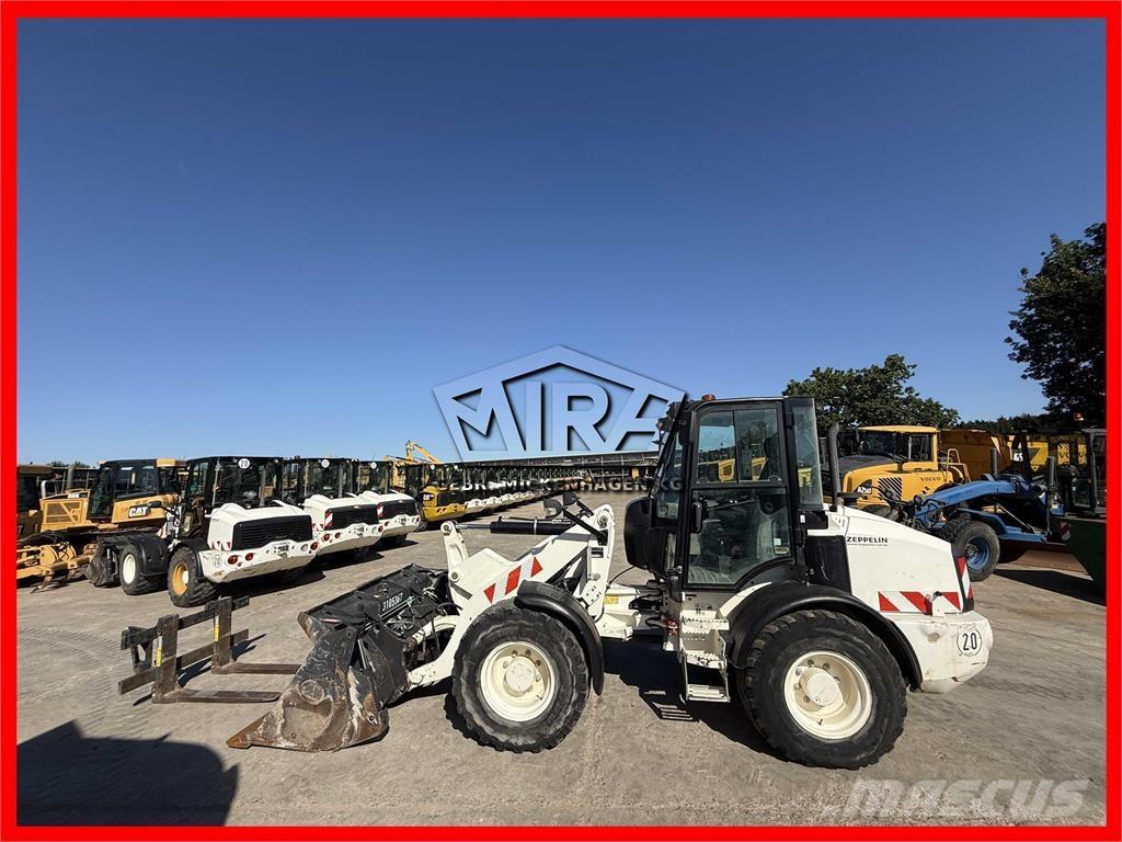 CAT 908 M لوادر بعجل