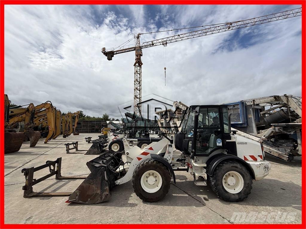 CAT 908 M لوادر بعجل