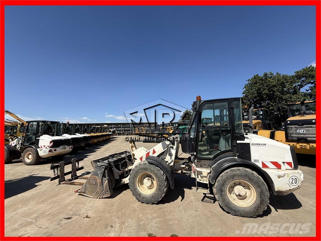 CAT 908 M لوادر بعجل