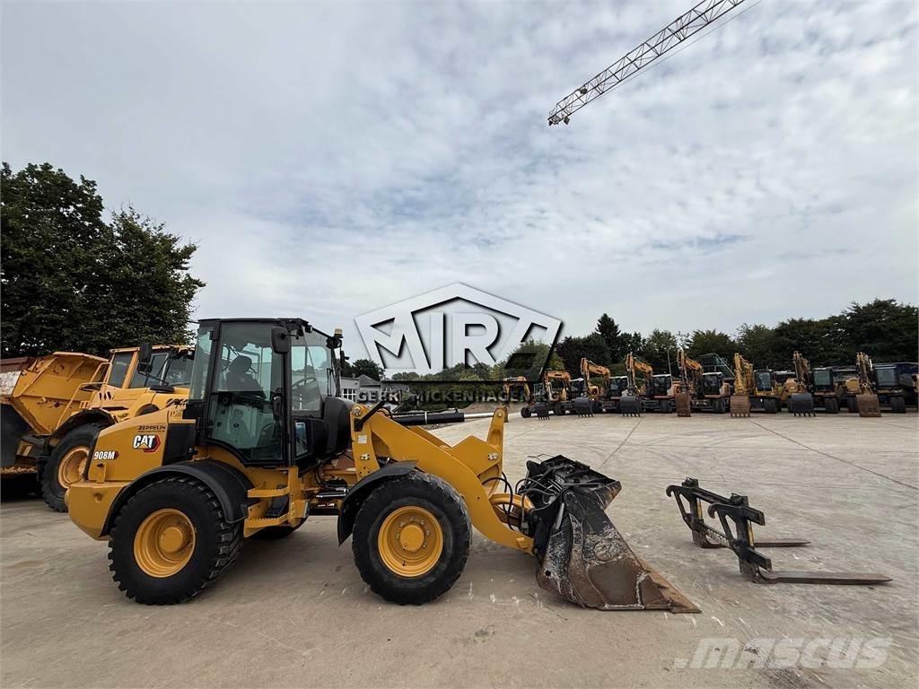 CAT 908M لوادر بعجل