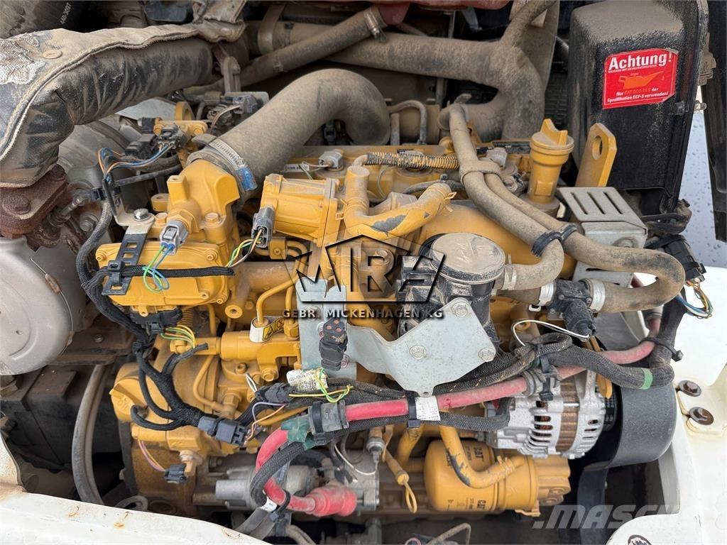 CAT 908M لوادر بعجل
