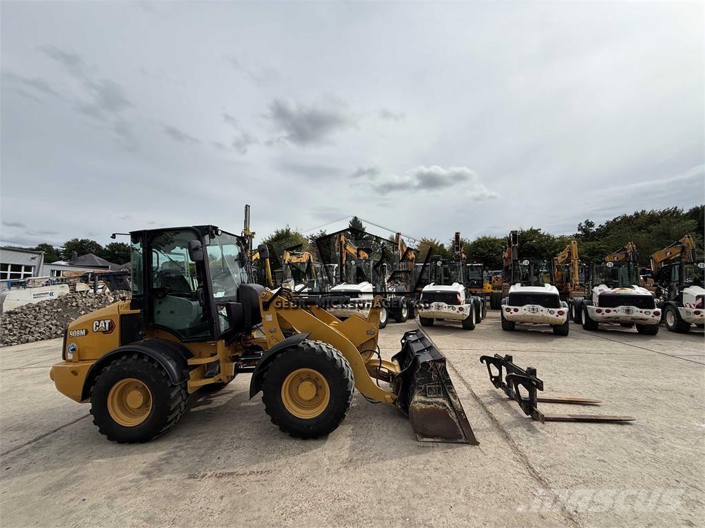 CAT 908M لوادر بعجل