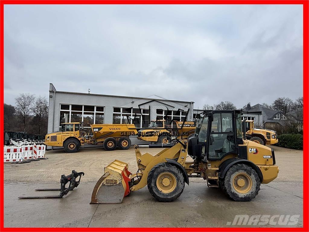 CAT 908M لوادر بعجل