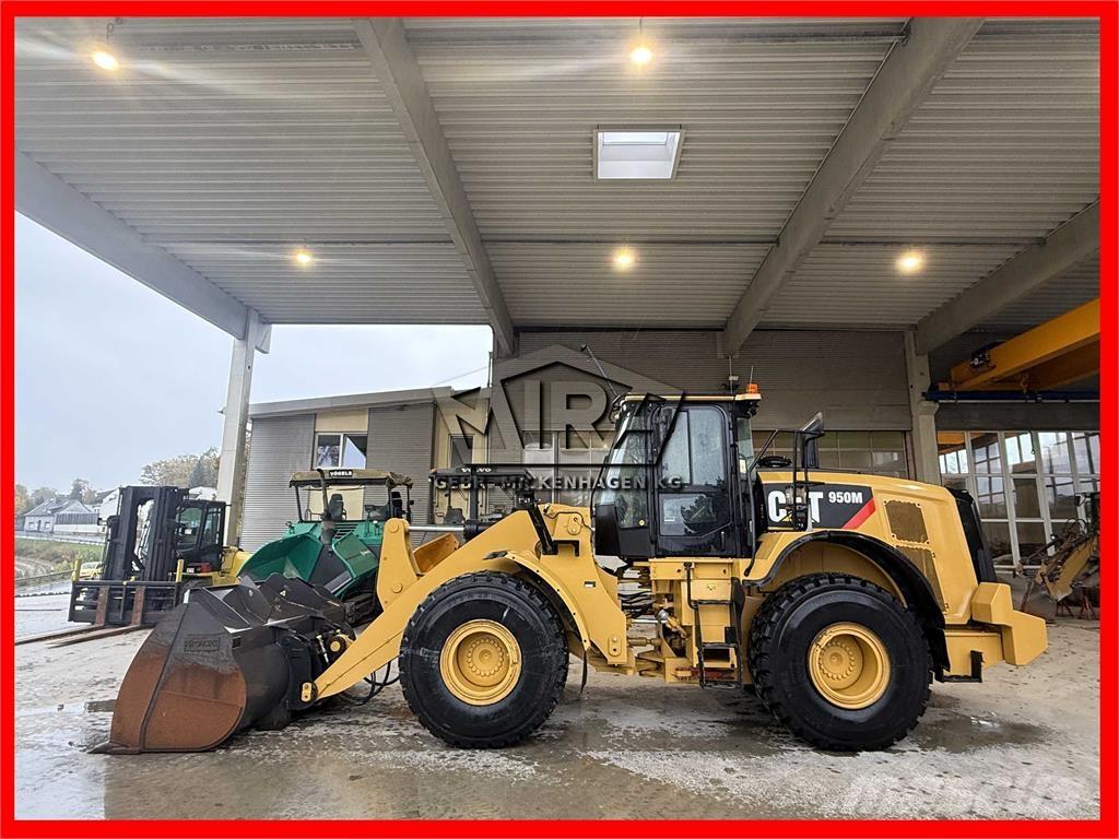 CAT 950M لوادر بعجل