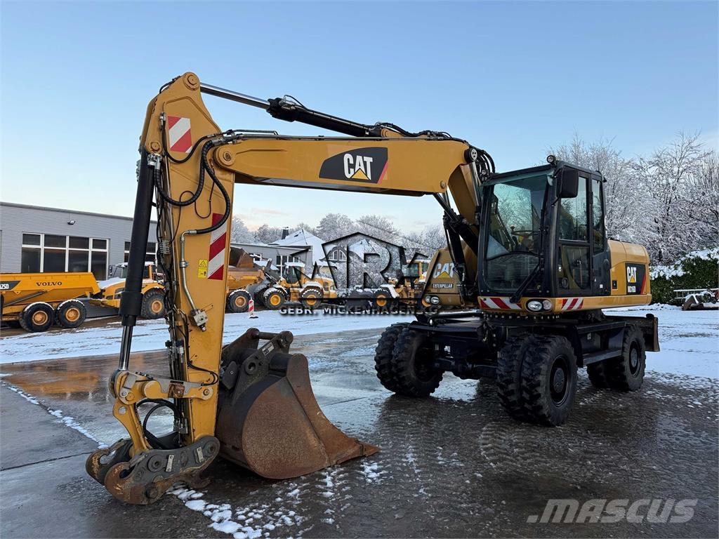 CAT M 316 D حفارات بعجل