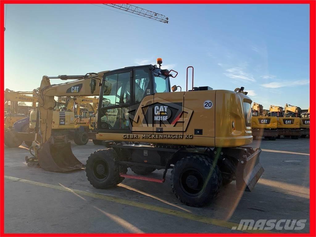 CAT M 316 F حفارات بعجل