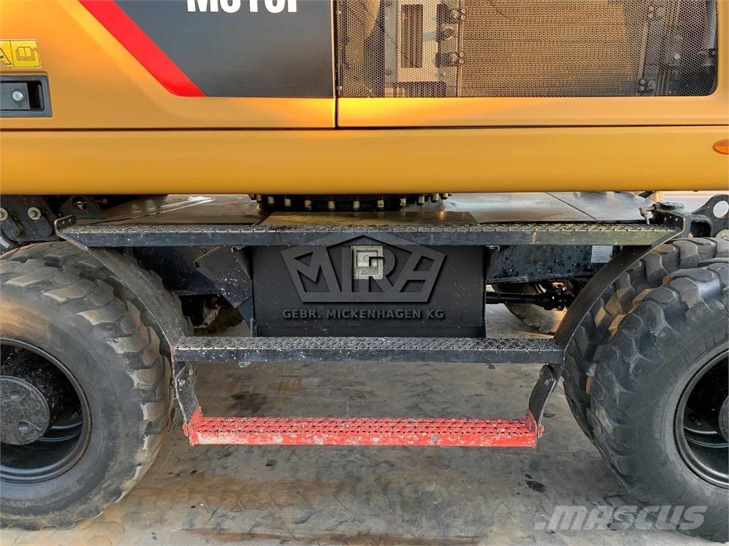 CAT M 316 F حفارات بعجل