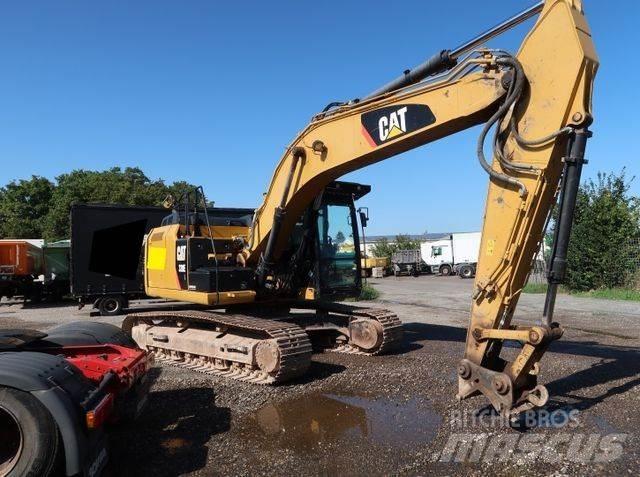 CAT 320 E حفارات زحافة