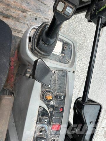 CAT 906H حفارات بعجل