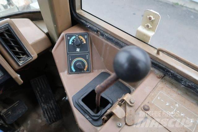CAT 910 E لوادر بعجل