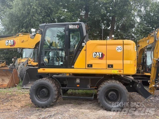 CAT M 314 NEU حفارات بعجل
