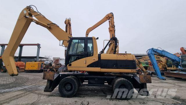 CAT M 318 C / 35 حفارات بعجل