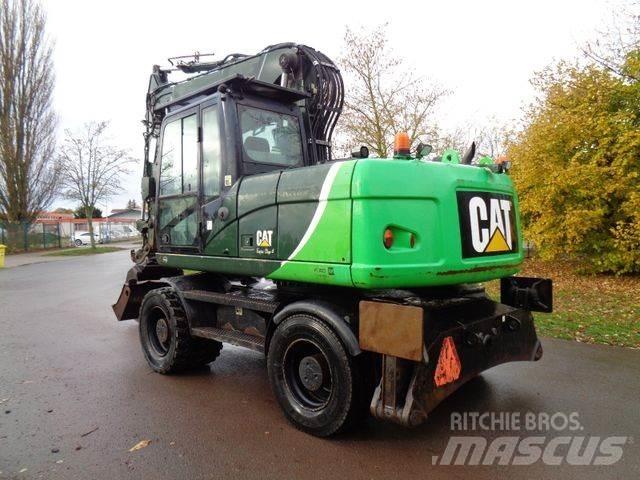 CAT M315 D حفارات بعجل