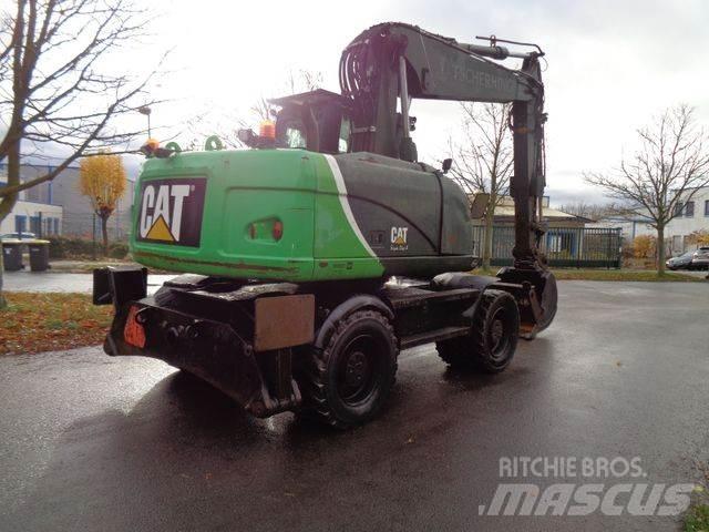 CAT M315 D حفارات بعجل