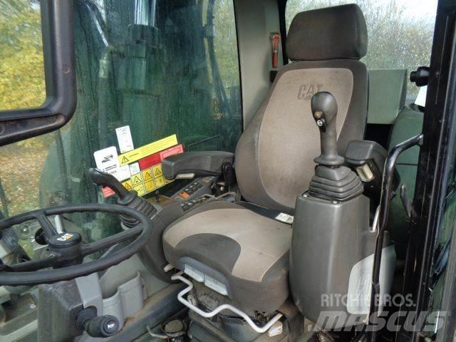 CAT M315 D حفارات بعجل