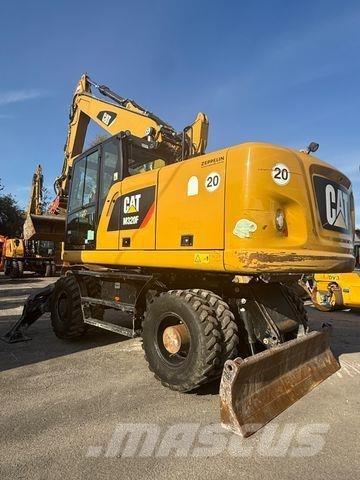 CAT M320 F حفارات بعجل