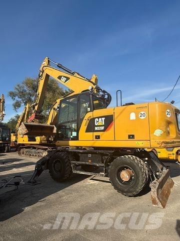 CAT M320 F حفارات بعجل