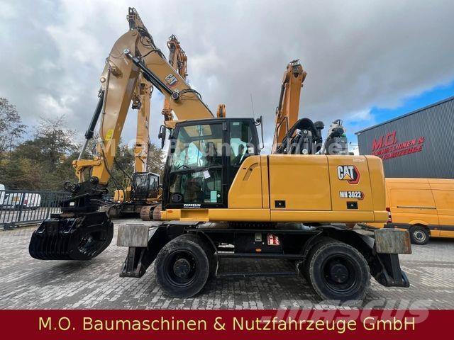 CAT MH 3022 حفارات بعجل