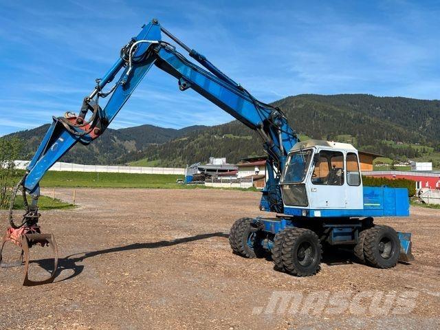 Fuchs 713 حفارات بعجل