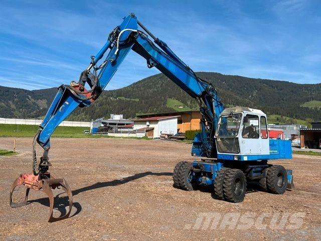 Fuchs 713 حفارات بعجل