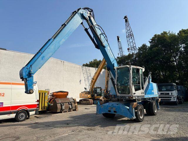 Fuchs MHL 320 حفارات بعجل