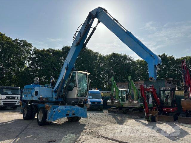 Fuchs MHL 320 حفارات بعجل