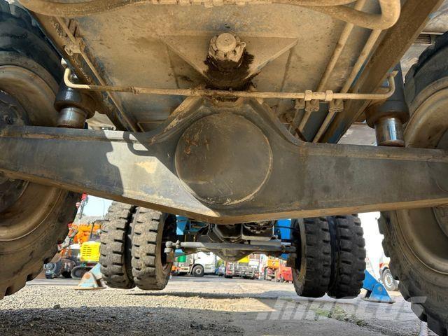 Fuchs MHL 320 حفارات بعجل