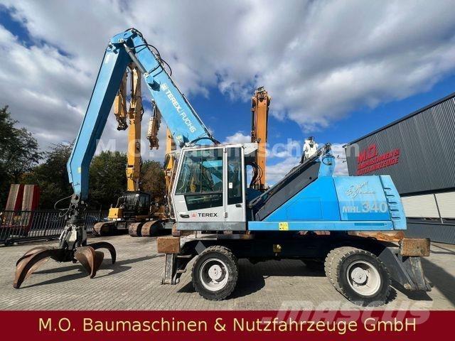 Fuchs MHL 340 حفارات بعجل