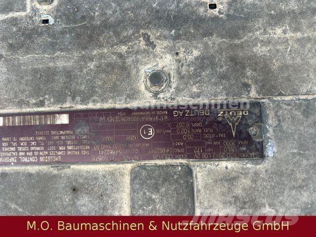 Fuchs MHL 340 حفارات بعجل