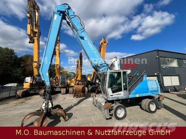 Fuchs MHL 340 حفارات بعجل